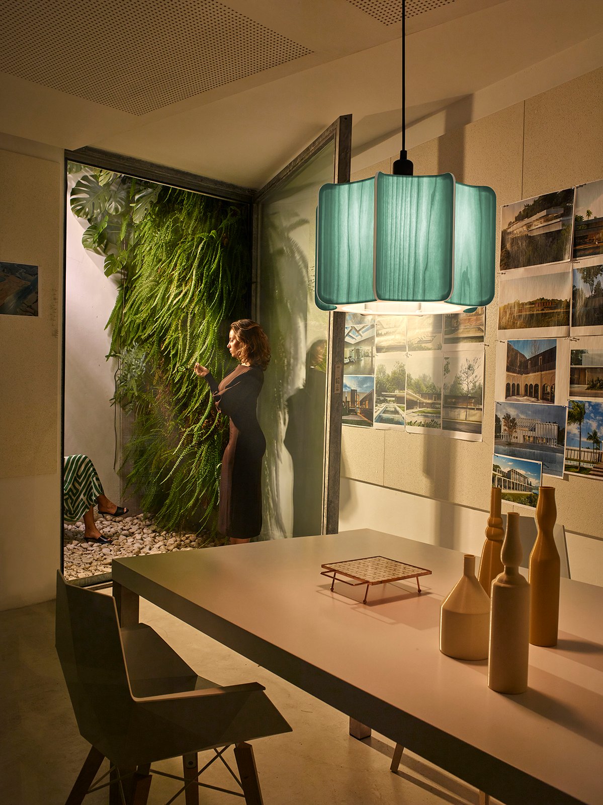 living room illuminated with a lamp shade made of wood veneer with a cactus silhouette